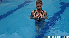 Ashlee Rose Teases Wet in Silver Underwater Dress