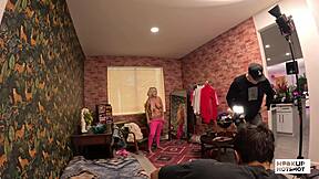 i strip out of this kinky outfit, teasing my huge fake tits