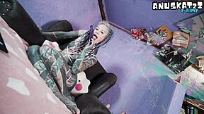 Tattooed Goth Model Teases with Live Anal Toy Penetration