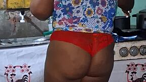 thick ebony bbw shows off her huge curvy ass and big tits in kitchen