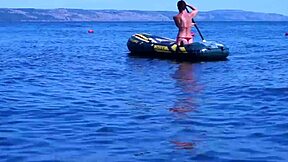 amateur mature woman poses erotically in bikini on boat floating volga river outdoors