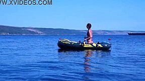 amateur mature woman poses erotically in bikini on boat floating volga river outdoors