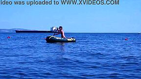 amateur mature woman poses erotically in bikini on boat floating volga river outdoors