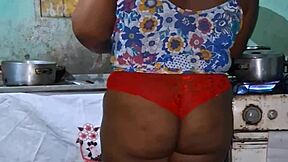 thick ebony bbw shows off her huge curvy ass and big tits in kitchen