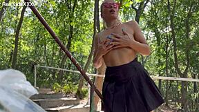 blonde cougar in glasses and miniskirt rams big vibrator deep into shaved wet cunt till red and dripping outdoors