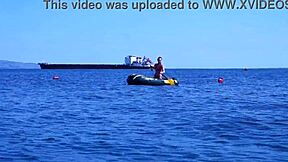 amateur mature woman poses erotically in bikini on boat floating volga river outdoors