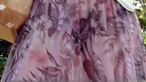 Hairy mature flashes plump pussy through see-through dress outdoors