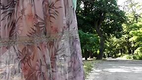 Hairy mature flashes plump pussy through see-through dress outdoors