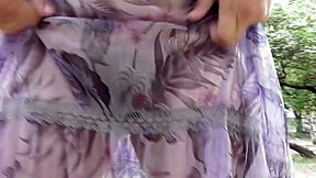 Hairy mature flashes plump pussy through see-through dress outdoors