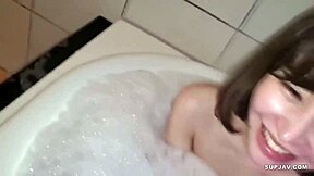 Elegant Japanese babe indulges in toy play and raw action.